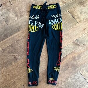 Norma Kamali Super Techno Graphic Joggers S Logo Stretch Pants